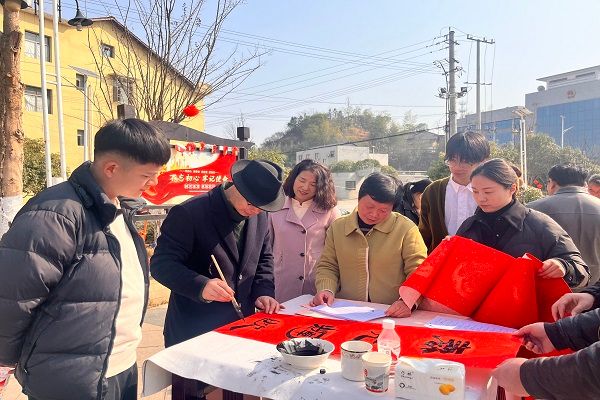民进长沙市委会赴宁乡、望城多地开展“春联万家”活动1